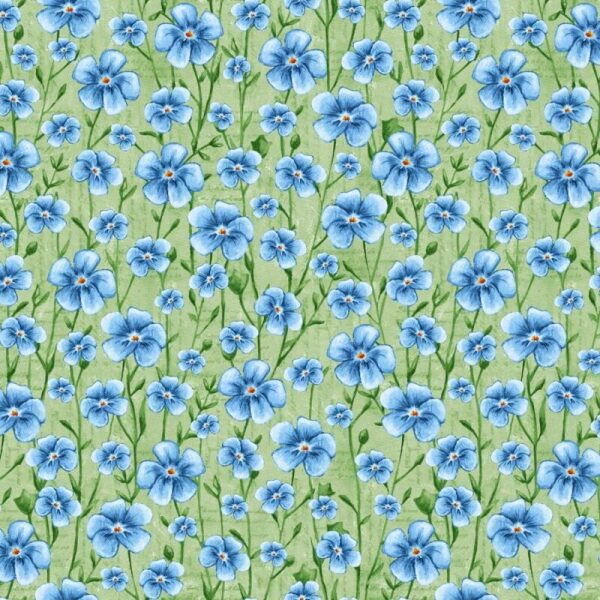 Blå blomster på grønn eng